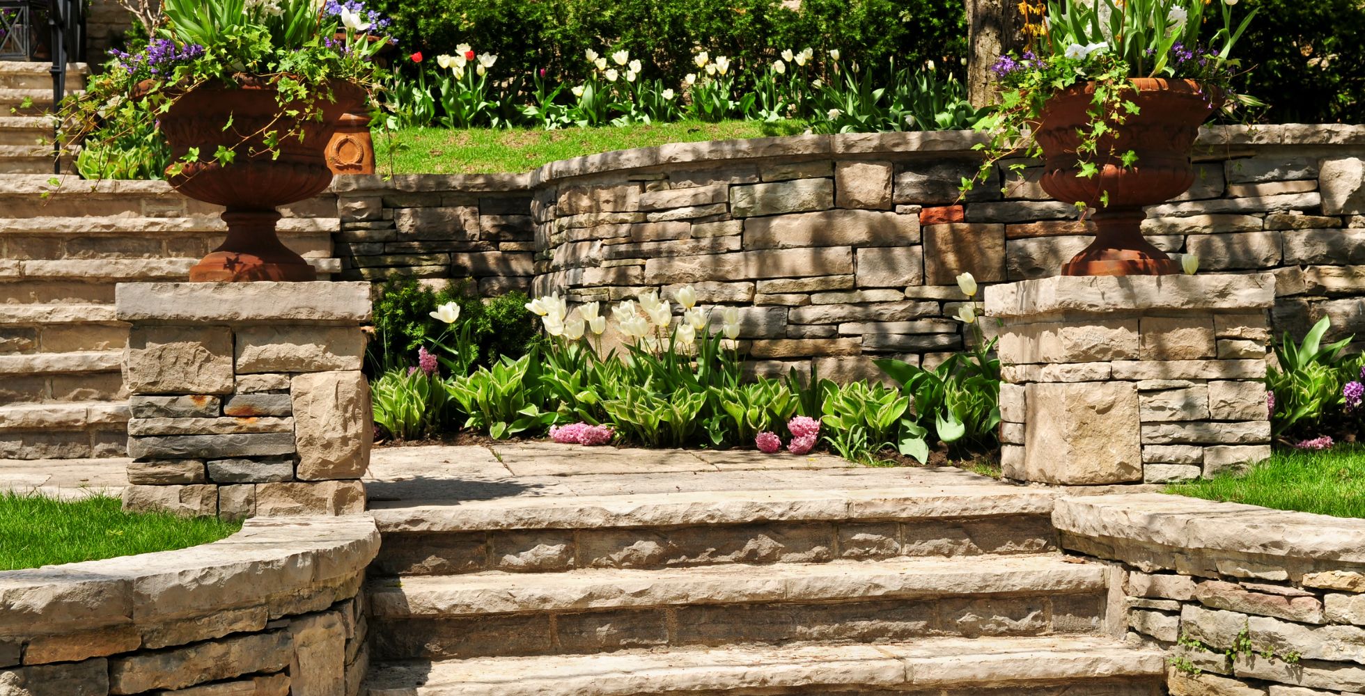 creating a natural connection integrating stone stairways into your landscape design